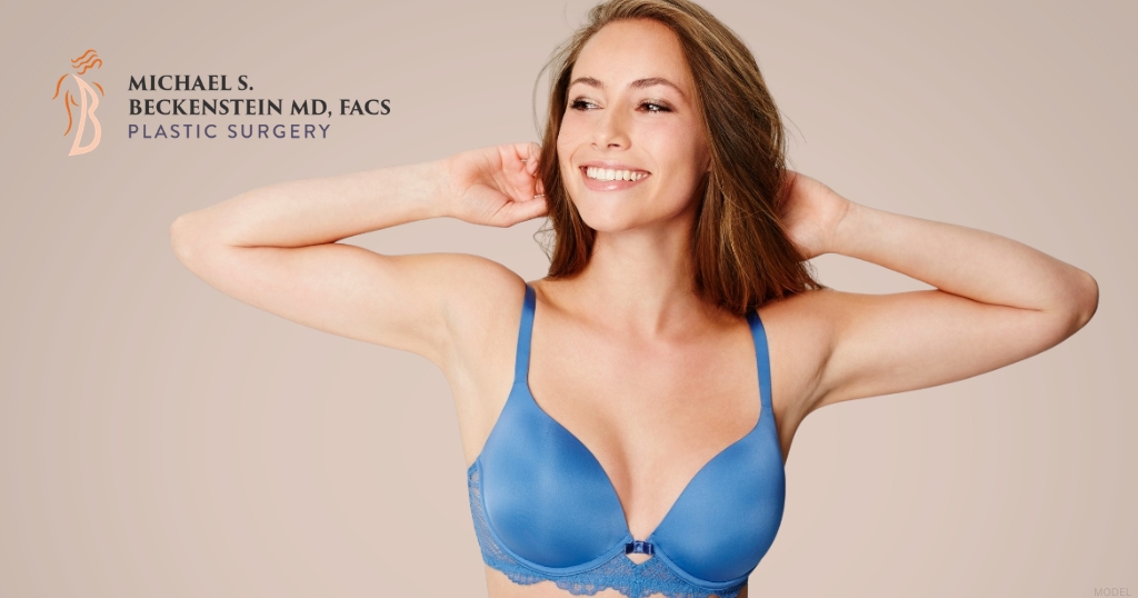 Woman post breast augmentation procedure (model)