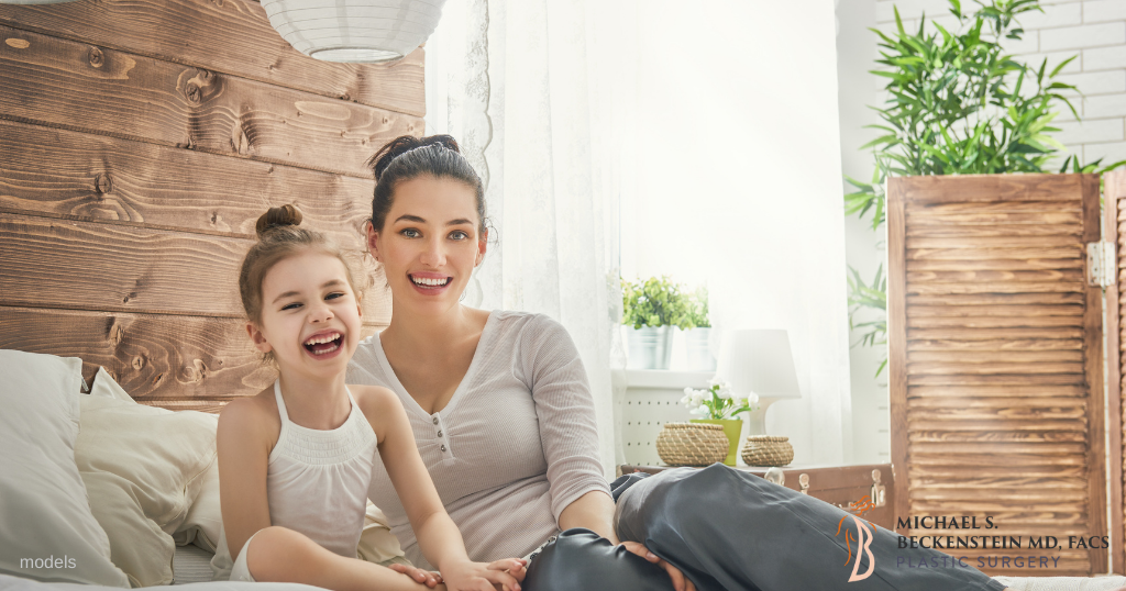 Mom with daughter laughing