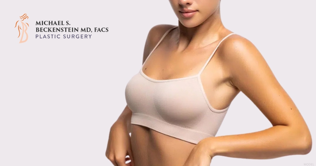 Woman post breast augmentation procedure (model)